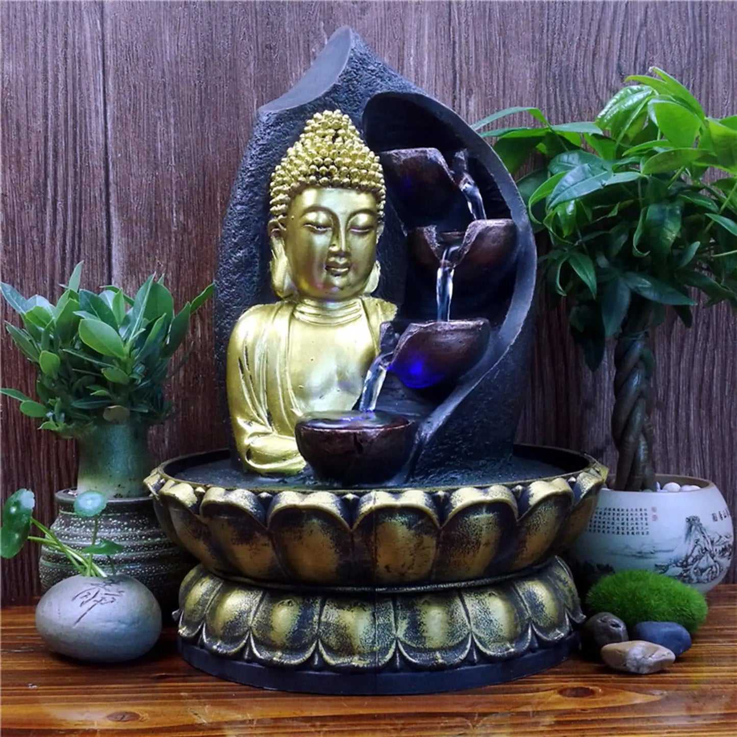 statue de chute d'eau zen Buddha
