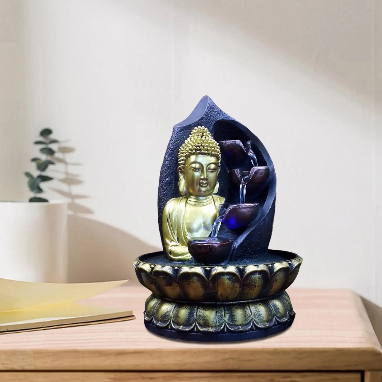 statue de chute d'eau zen Buddha