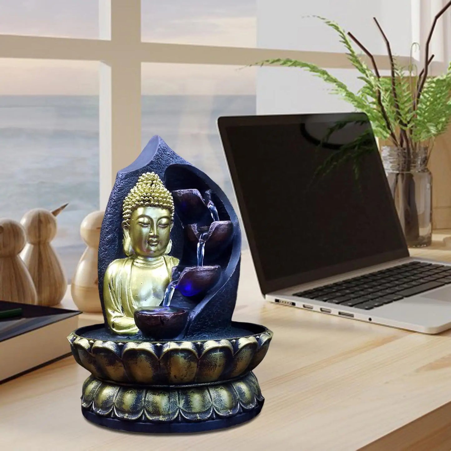 statue de chute d'eau zen Buddha