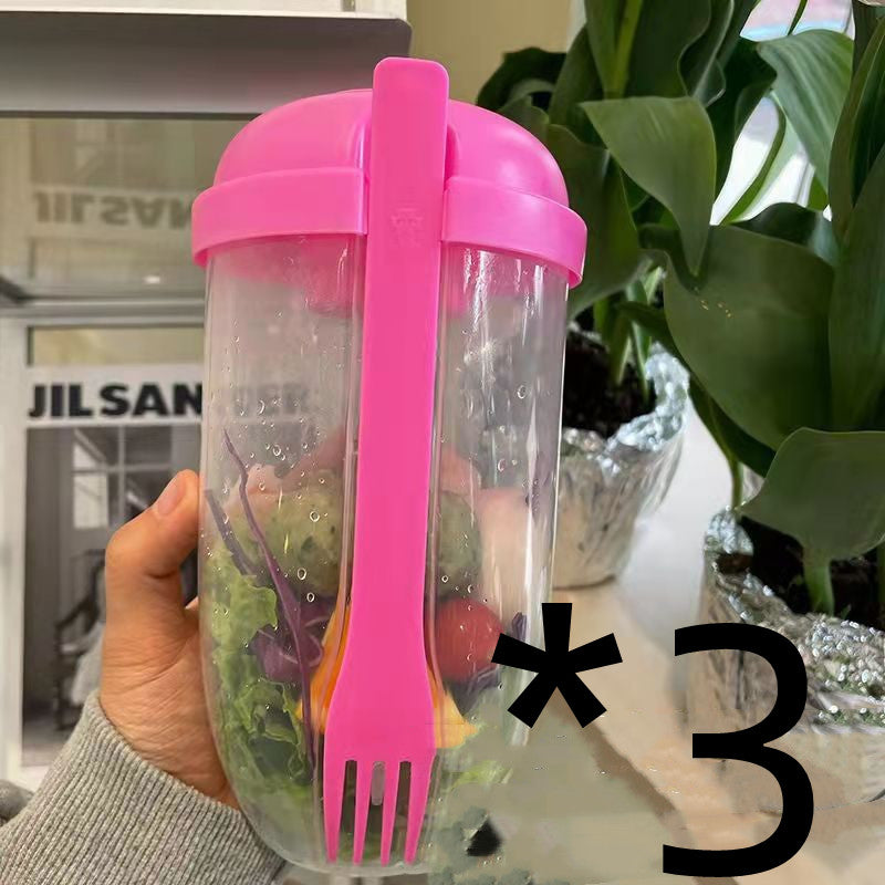 La tasse à salade avec fourchette et couvercle est portable