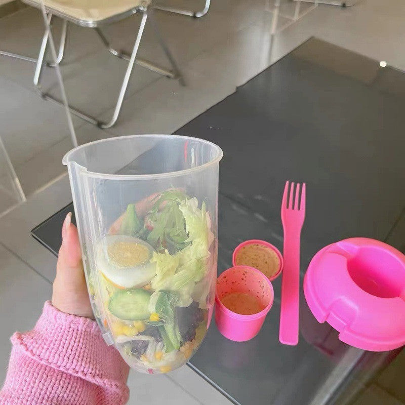 La tasse à salade avec fourchette et couvercle est portable