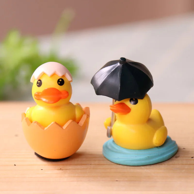 Lot de 4 mini figurines de canard