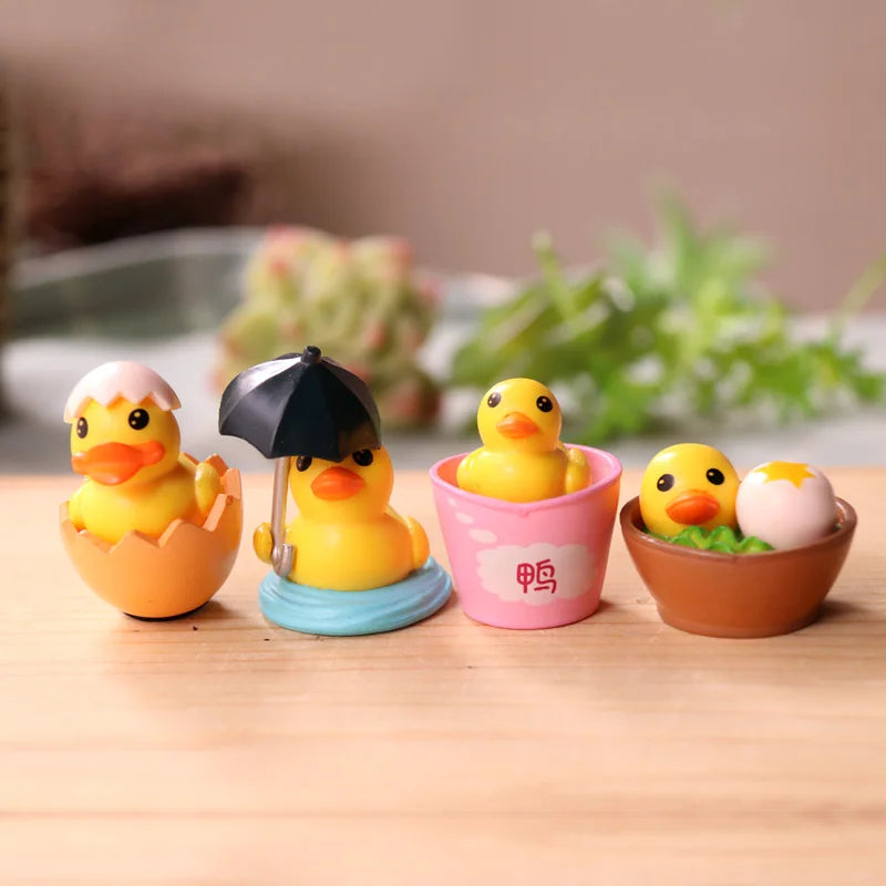 Lot de 4 mini figurines de canard