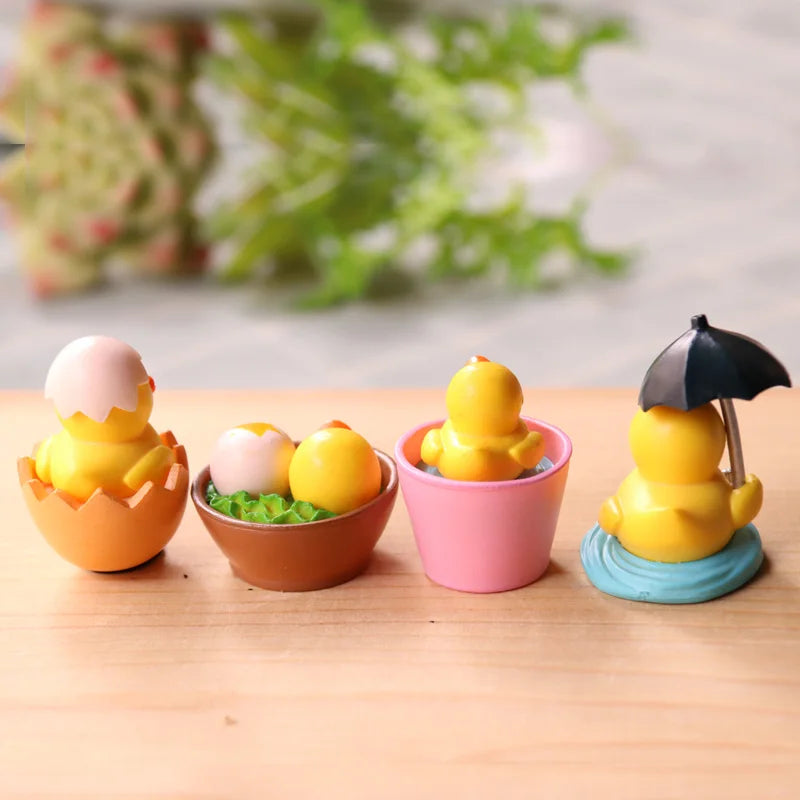 Lot de 4 mini figurines de canard