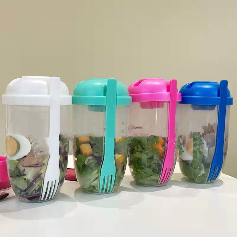 La tasse à salade avec fourchette et couvercle est portable