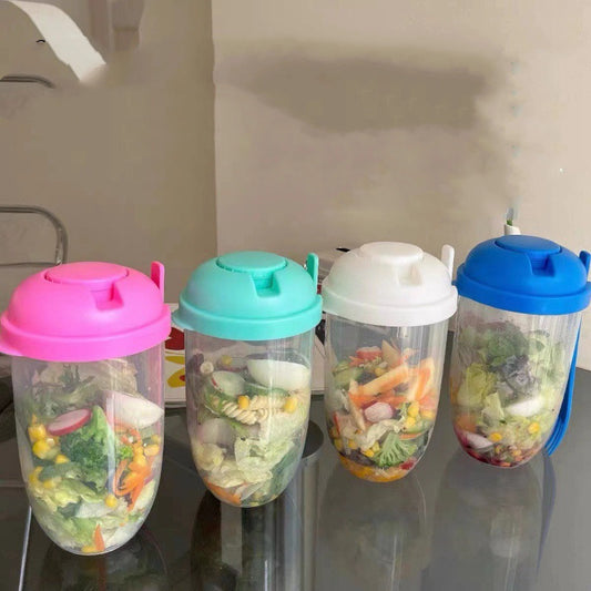 La tasse à salade avec fourchette et couvercle est portable